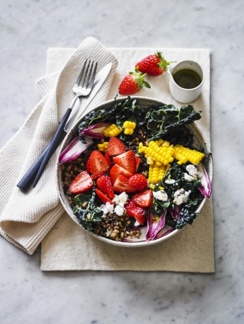 Warm chicken grain bowl with strawberry