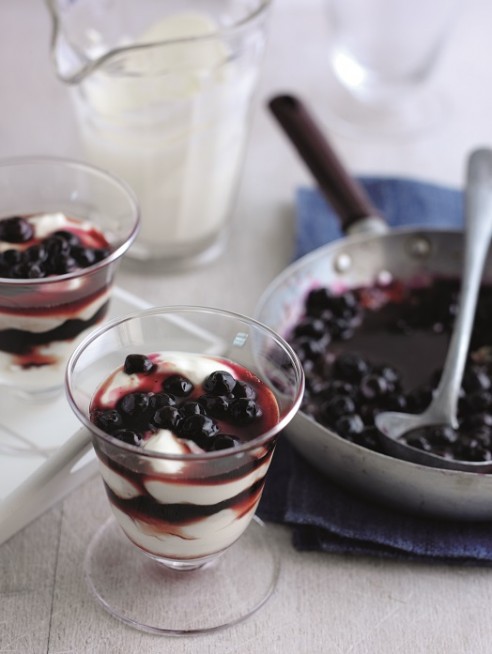 Caramel poached blueberries with crème fraiche